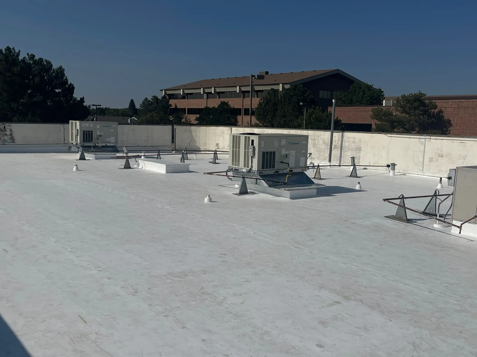 RTUs, vents and gas line supports flashed