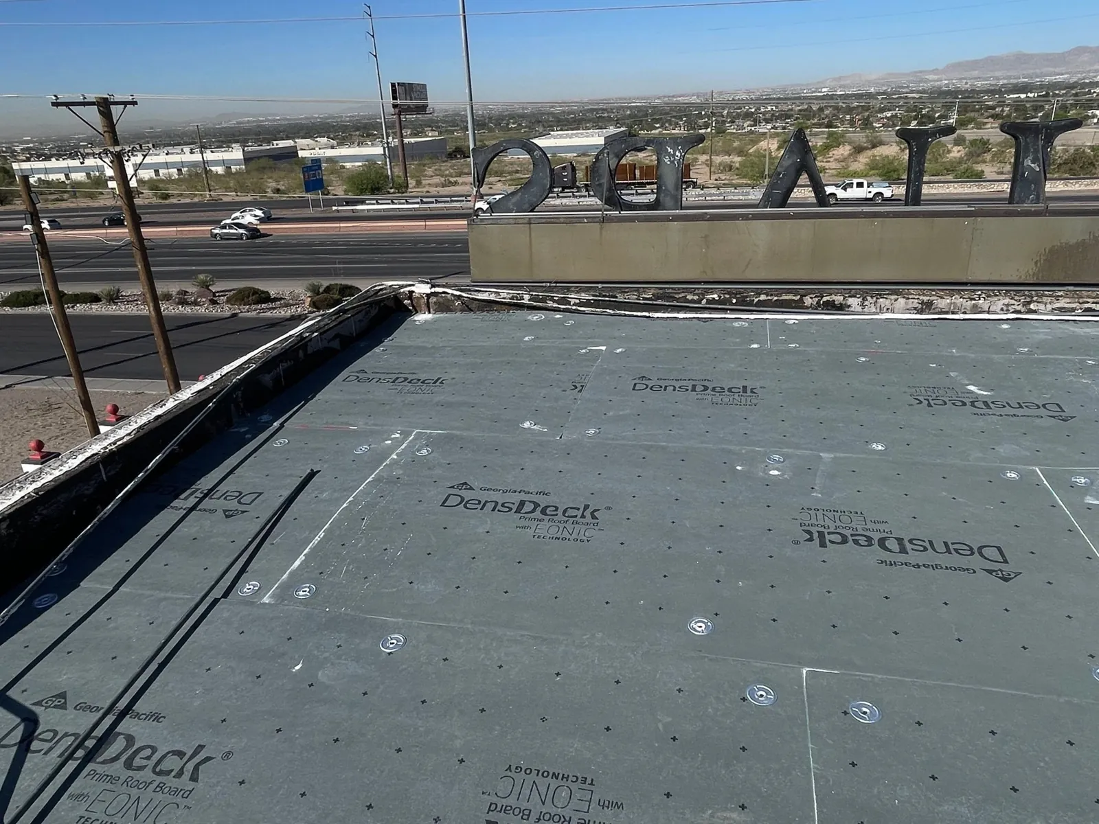 DensDeck Prime cover board over the existing roof