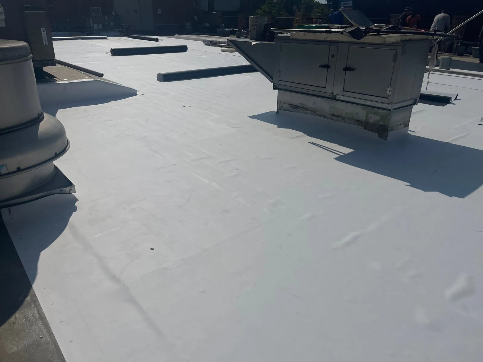 New TPO membrane going down over DensDeck